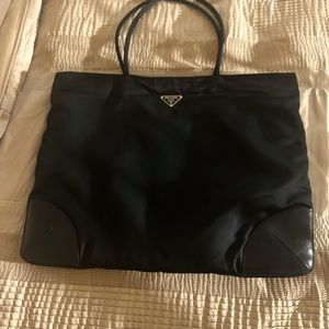 Beautiful black Prada laptop or shoulder bag. Preloved and in good condition.